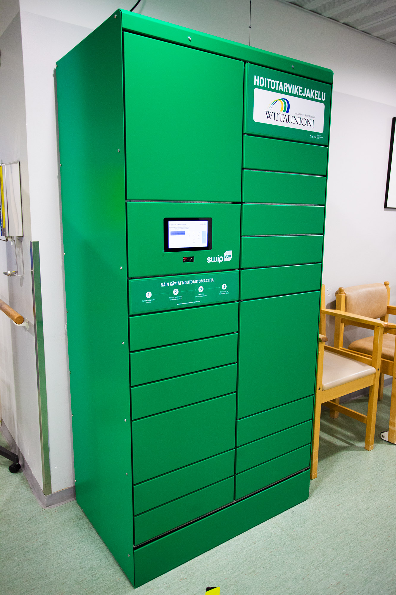 Vihrea hoitotarvikkeiden automaatti